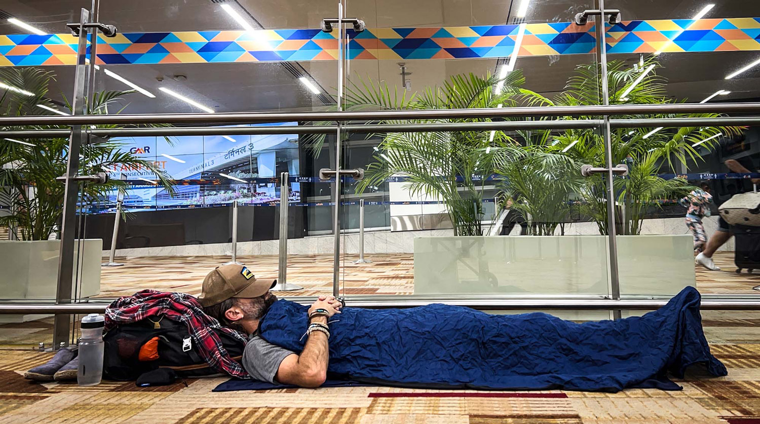 Sleeping in the Delhi Airport.