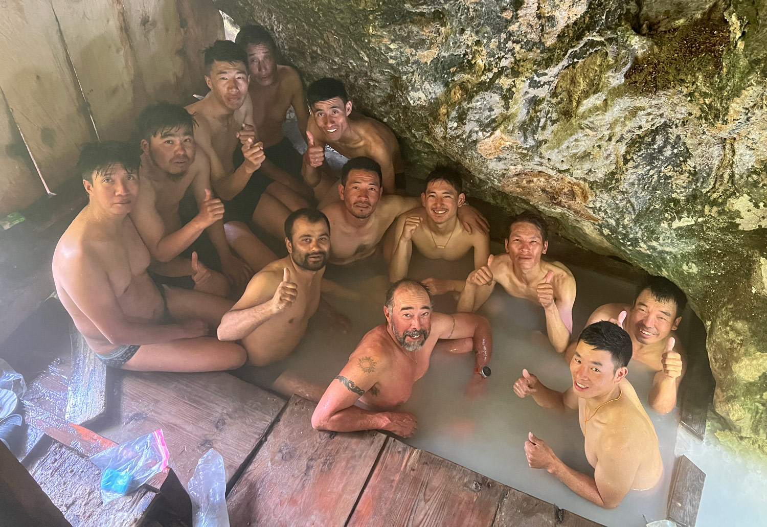 The whole crew in a hot tub.