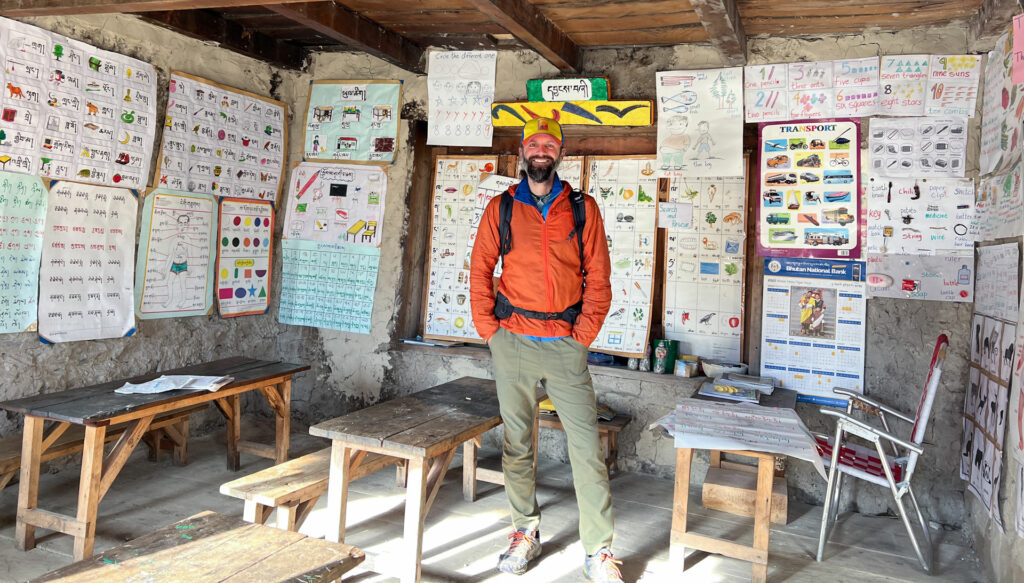 Chris standing in a classroom.