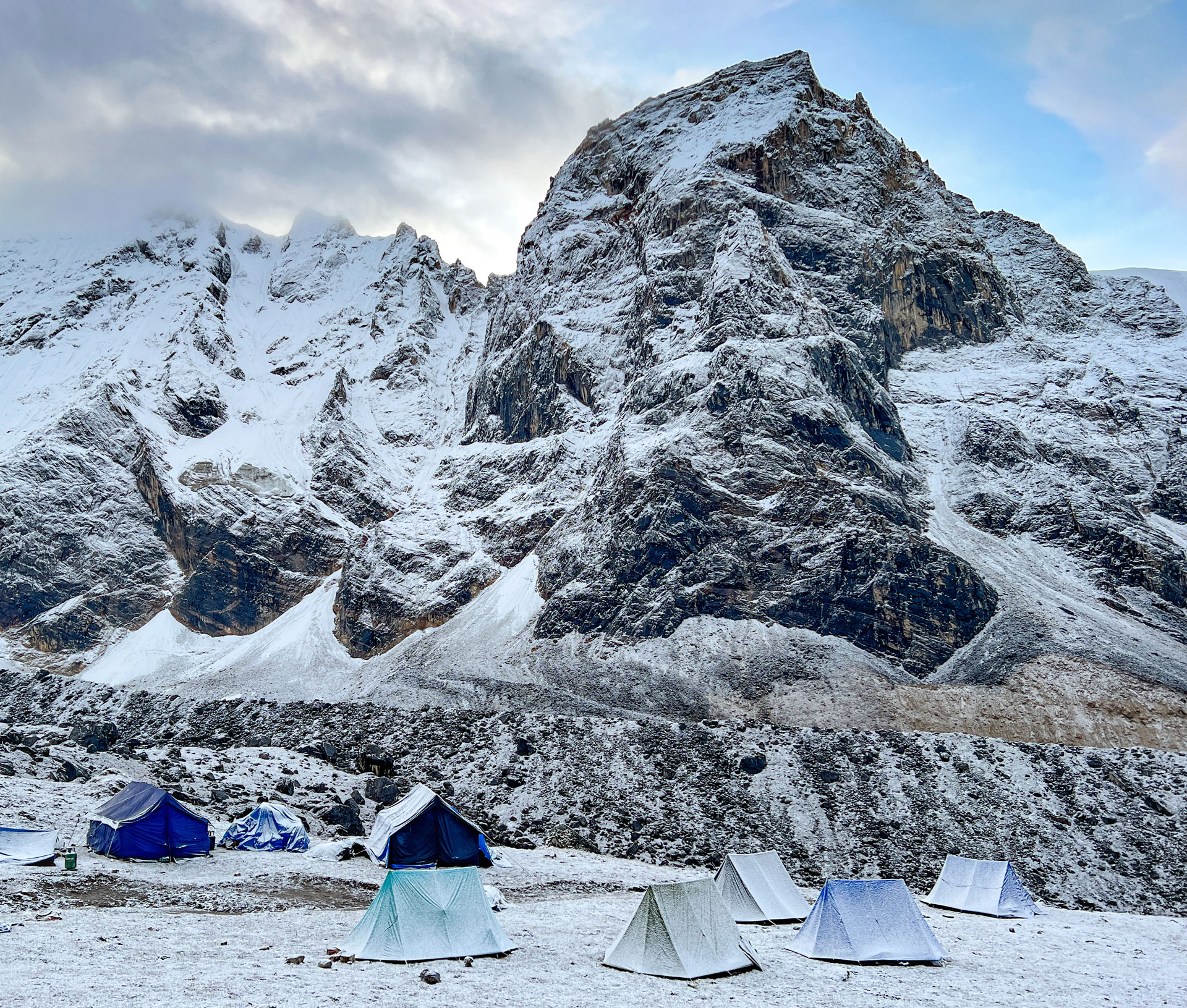 Snow covering camp.