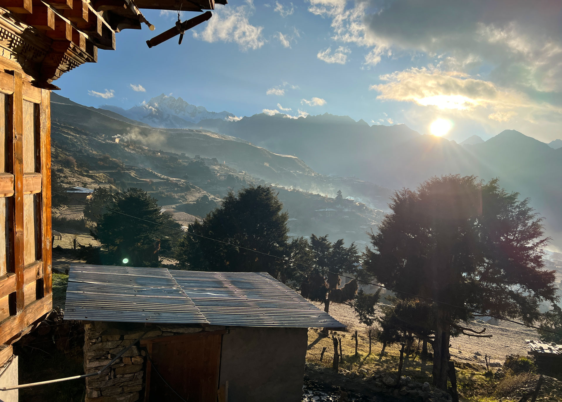 The sun coming up over Laya, Bhutan.