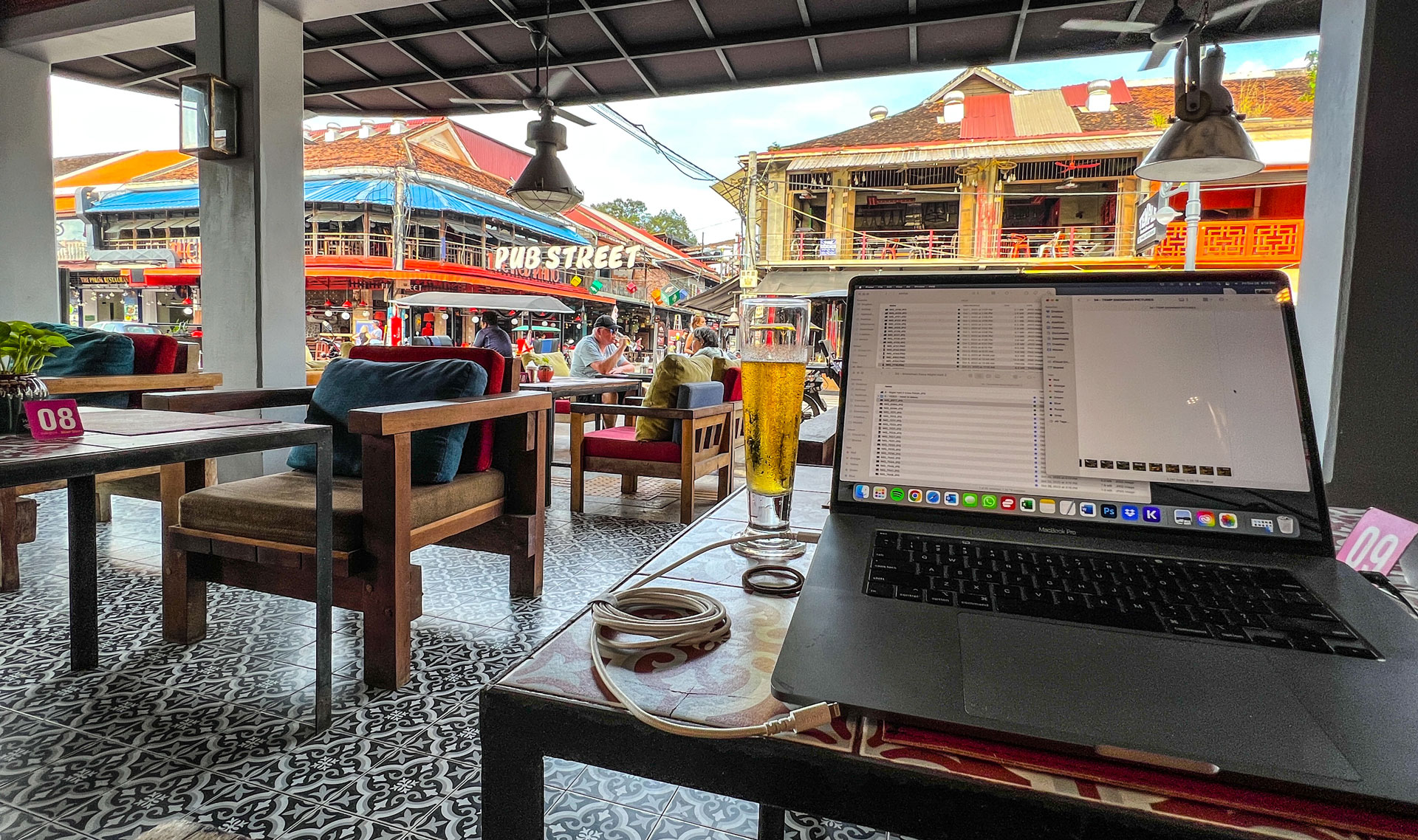 Working on my laptop from a cafe on Pub Street.